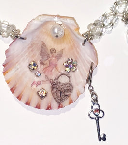 Petri Kitsch, Paulette Sabato , Charm, Seashell Jewelry, Crystal Charm, Fairy charm, fairy necklace, teddy bear, keychain, charm necklace, charm bracelet, crystal charm, dangly charm, pearl necklace, freshwater pearl, kathleen, kathleen los angeles, handmade, handmade jewelry, independent jewelry, upycled fashion, upcycled jewelry, sustainable jewelry, beaded keychain, los angeles fashion, heart lock, key charm, key necklace